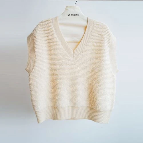 Pull col roulé en maille torsadée sans manches