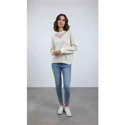 Puis-je trouver des manteaux en laine pour femme aux couleurs pastel ?