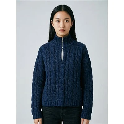 Pull en tricot torsadé à demi-zip