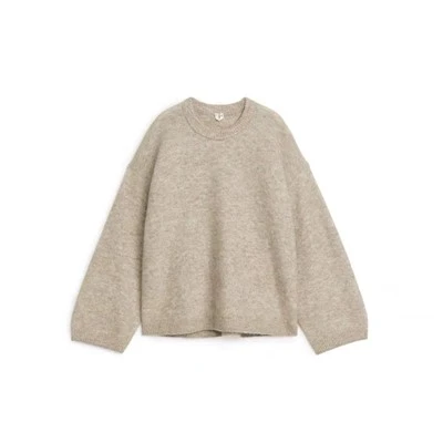 Pull tricoté à col roulé rayé de créateur pour femme