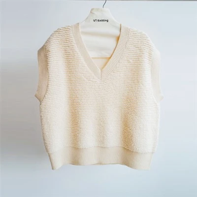 Pull col roulé en maille torsadée sans manches